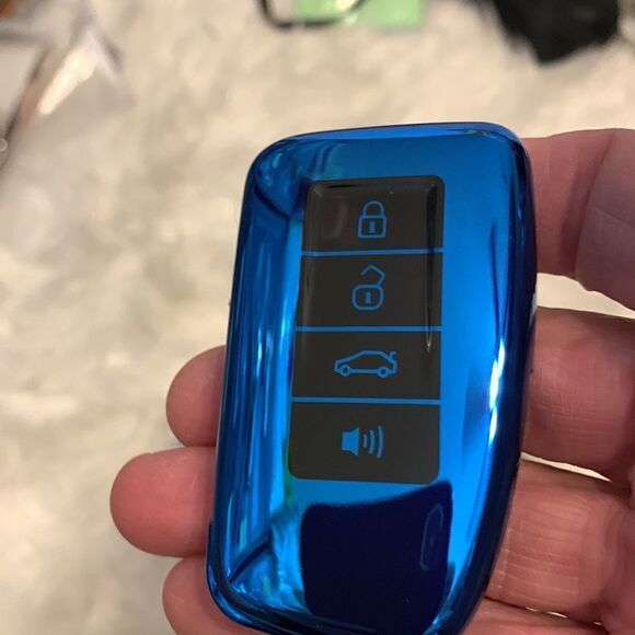 Lexus key fob with three key attached circle connectors for home/office keys. - Picture 2 of 6